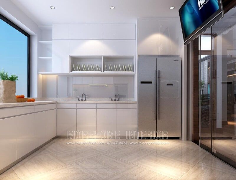 Tủ bếp đẹp được thiết kế riêng biệt, sử dụng vách kính cường lực cao cấp tạo độ thoáng cũng như tránh ám mùi cho các không gian sinh hoạt khác